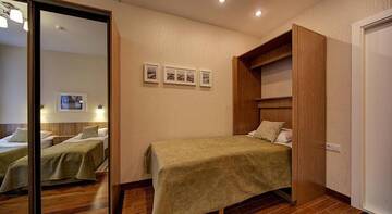 Фото номера Стандартный трехместный номер Гостиница Davidov Guest House г. Санкт-Петербург 2