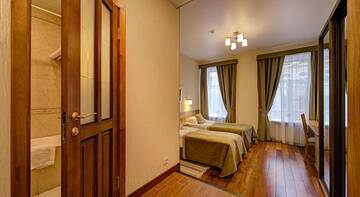 Фото номера Стандартный трехместный номер Гостиница Davidov Guest House г. Санкт-Петербург 6