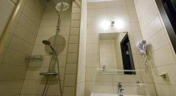 Фото номера Стандартный двухместный номер с 2 отдельными кроватями Гостиница Inn Center г. Санкт-Петербург 3
