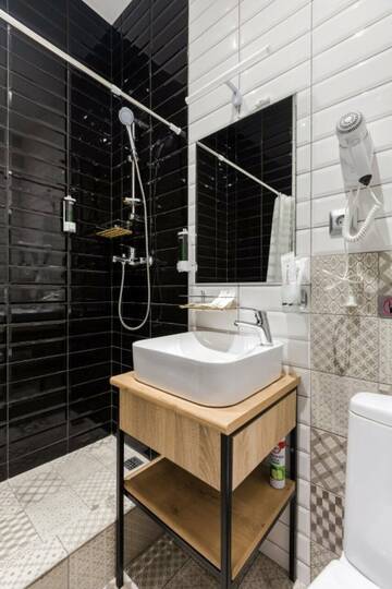 Фото номера Улучшенный двухместный номер с 1 кроватью Мини-отель Номера на Гончарной г. Санкт-Петербург 11