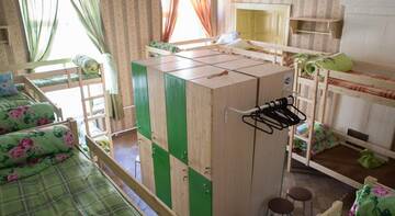 Фото номера Верхнее спальное место на двухъярусной кровати в общем номере для женщин Гостиница Хостел Васькин Дом г. Санкт-Петербург 7
