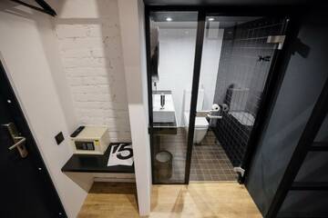 Фото номера MonoBox (одноместный номер) Гостевой дом InBox Capsule Hotel г. Санкт-Петербург 6