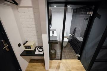 Фото номера 1-местный капсульный номер (без окна) Гостевой дом InBox Capsule Hotel г. Санкт-Петербург 5