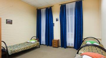Фото номера Стандартный четырехместный номер Гостиница Pestel Inn г. Санкт-Петербург 9