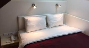 Фото номера Двухместный двухуровневый номер Гостиница Stony Island Hotel at Blagodatnaya г. Санкт-Петербург 2