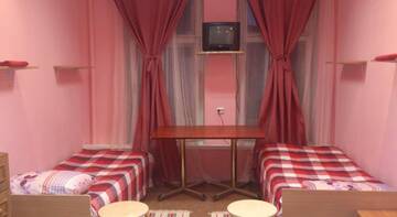 Фото номера Кровать в общем четырехместном номере Хостел Lira Mini Hotel г. Санкт-Петербург 4
