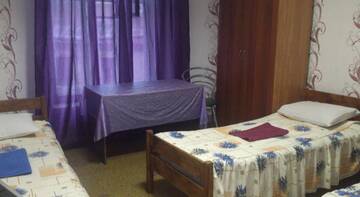 Фото номера Трехместный номер с общей ванной комнатой Хостел Lira Mini Hotel г. Санкт-Петербург 7