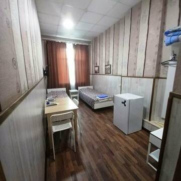 Фото номера Бюджетный двухместный номер с 2 отдельными кроватями Гостевой дом ПитерДом Черная Речка г. Санкт-Петербург 3