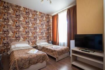 Фото номера Апартаменты с 2 отдельными кроватями Апарт-отель LeoHotels На Рижском г. Санкт-Петербург 2