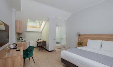 Фото номера Улучшенные апартаменты с террасой Отель Welton Сlub Hotel &amp; Apartments г. Санкт-Петербург 2