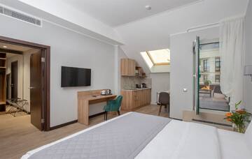 Фото номера Улучшенные апартаменты с террасой Отель Welton Сlub Hotel &amp; Apartments г. Санкт-Петербург 3