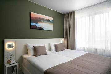 Фото номера Улучшенные апартаменты Отель Ramada Plaza by Wyndham Saint Petersburg г. Санкт-Петербург 2