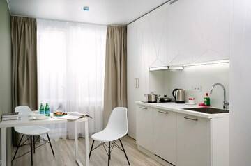 Фото номера Улучшенные апартаменты Отель Ramada Plaza by Wyndham Saint Petersburg г. Санкт-Петербург 3