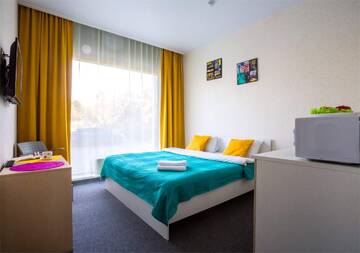 Фото номера Стандарт с одной двухспальной кроватью Отель Travel Hotels Neva u Moskovskogo Vokzala г. Санкт-Петербург 2