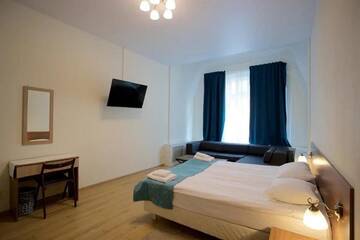 Фото номера Стандартный четырехместный номер Отель Mark Hotel г. Санкт-Петербург 3